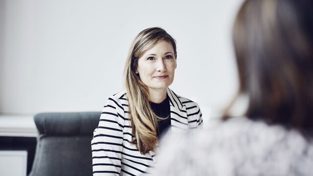 Nordea_xx_small-Female financial advisor in discussion with client during meeting in office.jpg